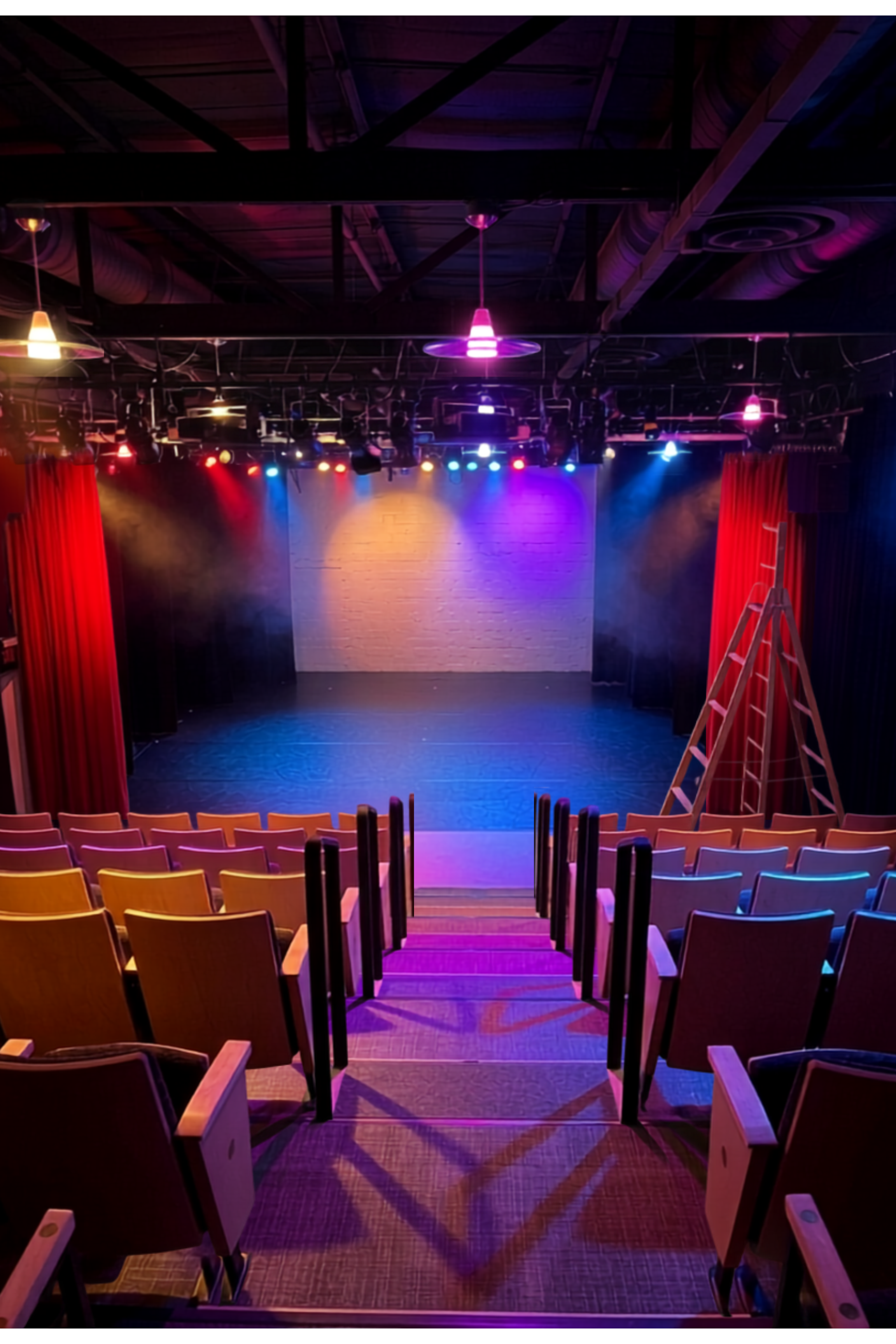View from audience, lights on.